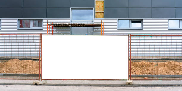 istock large white banner by grid fence against building closeup 1288688775