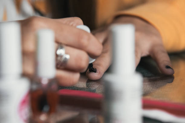 istock painting nails black 1288690665
