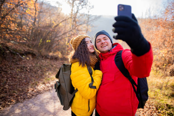 istock Happy young couple taking a selife from the hiking 1288693992