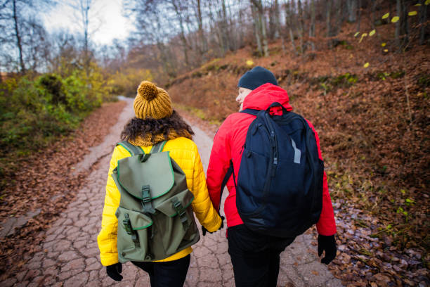 istock Young couple hiking together 1288694081