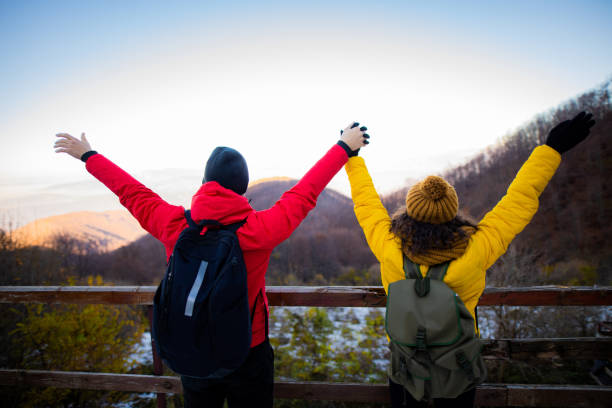 Couple enjoys in winter hiking