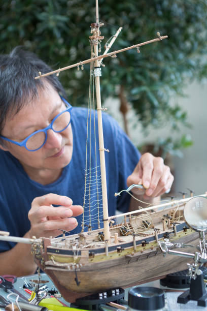 istock Retirement Hobby Leisure - Building Wooden Ship Kit Model 1288694331