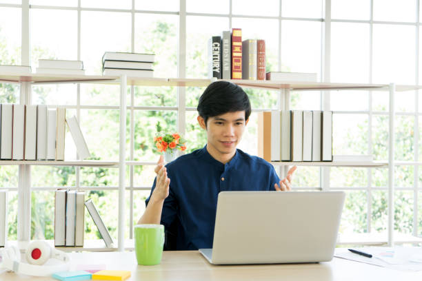 istock Social media influencer and business man work from home by laptop computer 1288694499
