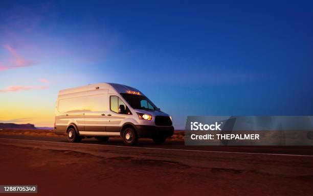 White Delivery Van Driving On Rural Road In Monument Valley Arizona Stock Photo - Download Image Now