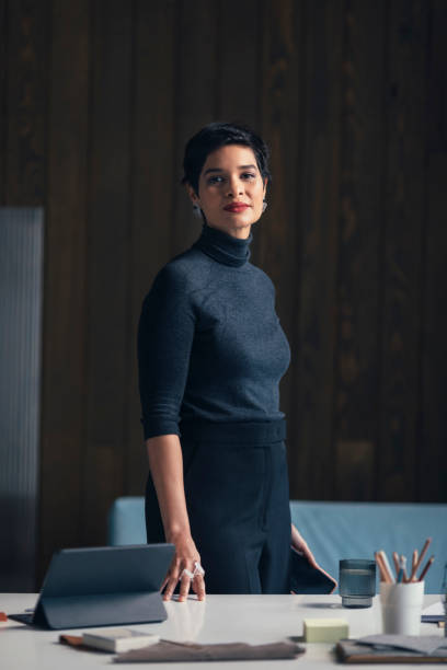 istock Portrait of an Architect Standing by her Desk at her Modern Spacious Studio 1288707144