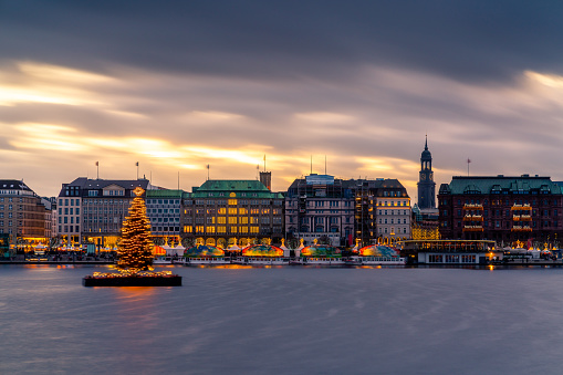Hamburg town hall and Alster Lake with Christmas market