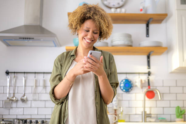 istock Young woman using smart phone 1288708243