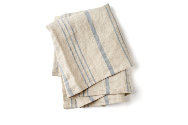istock Striped natural fabric napkin isolated on white background 1288709640