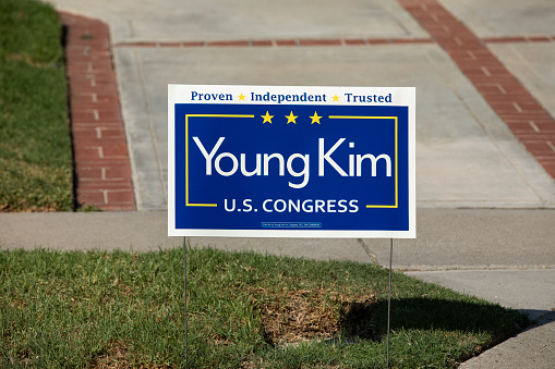 Placentia, California, USA - October 17, 2020: A house sports a political yard sign supporting candidate Young Kim for US Congress.