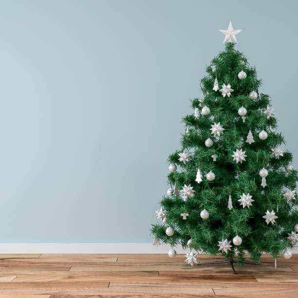 istock Empty simple living room with Christmas tree on light blue background 1288713954