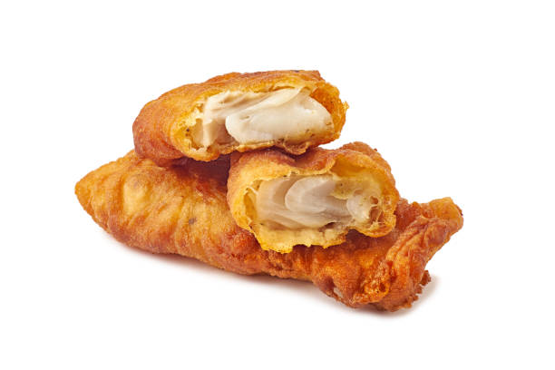 istock Crispy pieces of fish fry on white 1288721097