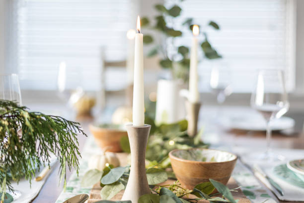 istock Closeup of candles on holiday dining table 1288729599