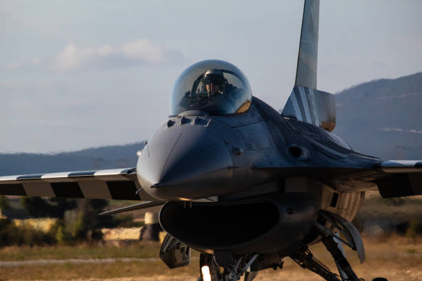 Dugny, France - June 20, 2025: Left-side view of a Hellenic Air Force F-16 Fighting Falcon, a multirole fighter jet manufactured by Lockheed Martin, taxiing at Paris-Le Bourget airport.