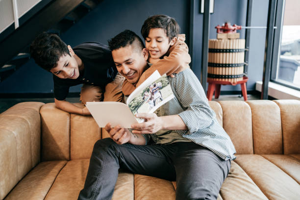 istock Father reading funny stories 1288730428