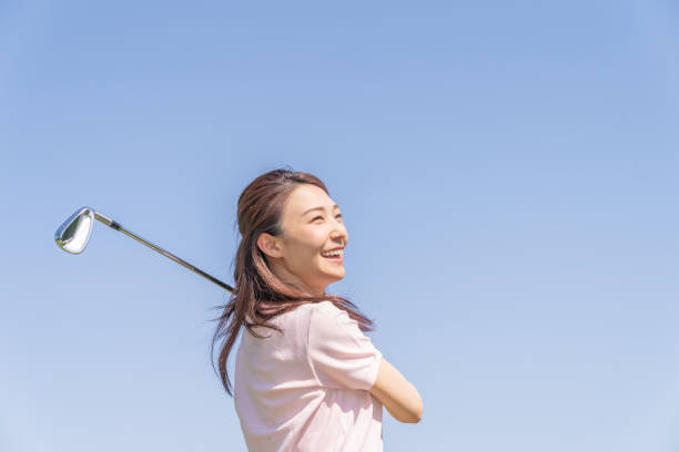 istock asian woman who golfs 1288732440