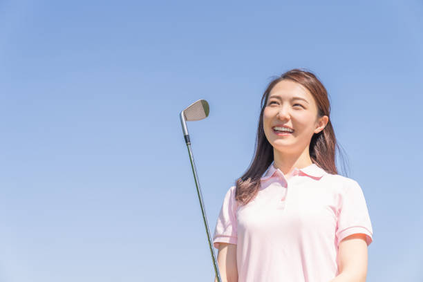 istock asian woman who golfs 1288732456