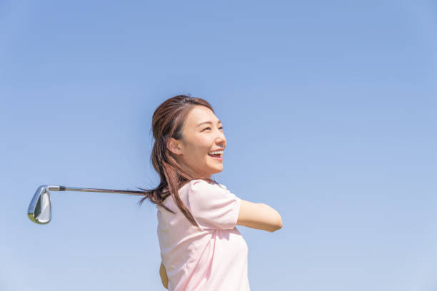 istock asian woman who golfs 1288732966