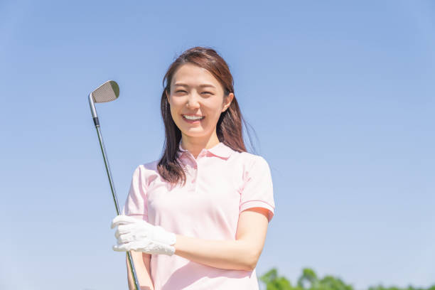 istock asian woman who golfs 1288732997