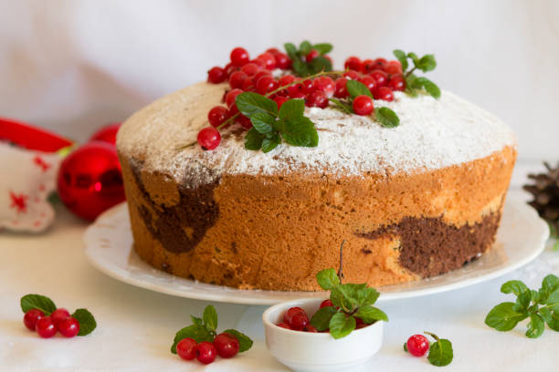 istock christmas chiffon cake with chocolate, powdered sugar, currant and mint 1288736608