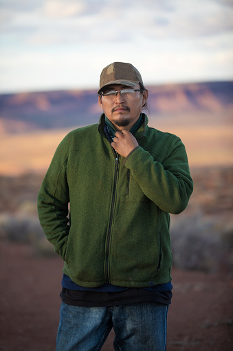 Confident Navajo man portrait in Monument Valley