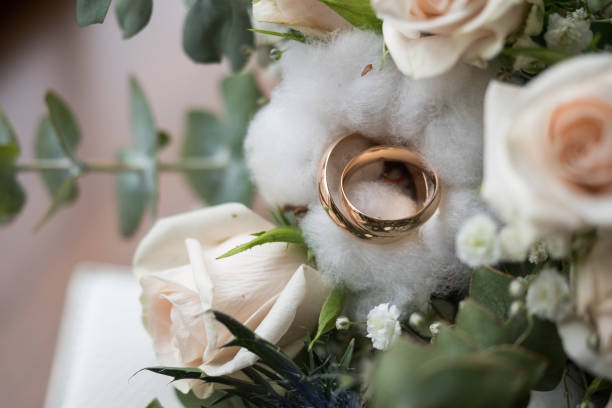 istock Bridal bouquet and wedding rings 1288751807