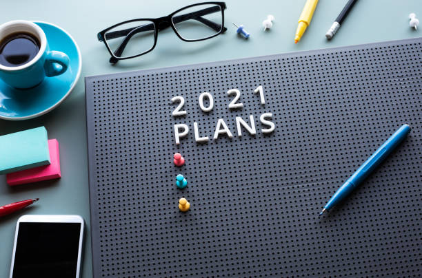 istock 2021 plan with text on desk table.Business management.motivation to success concepts 1288753350