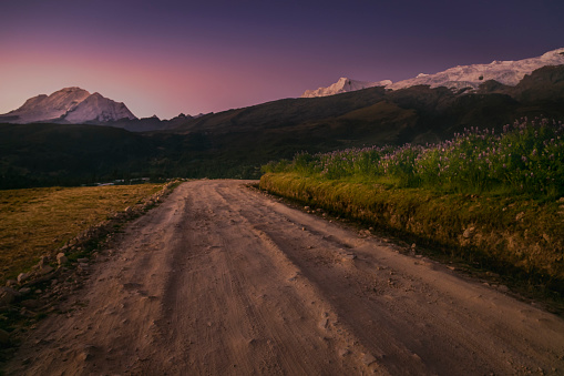 Country road into Cordillera Blanca valley and Huascaran massif at dawn – Ancash Andes near Huaraz, Peru