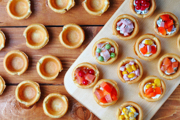 istock Light snacks for the festive table on a wooden table. Rustic background. 1288754457