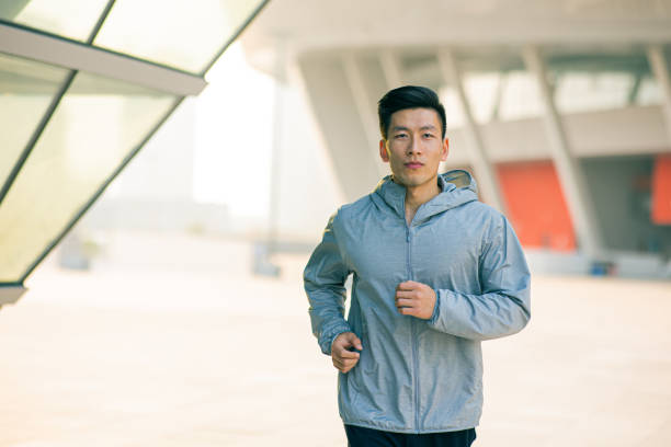 istock Young man running outdoors 1288755280