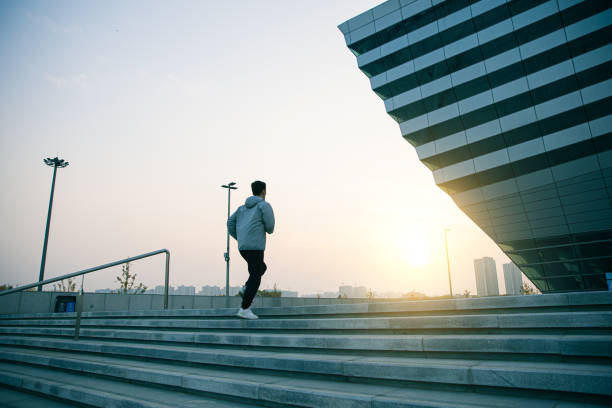 Man running up stair in the morning