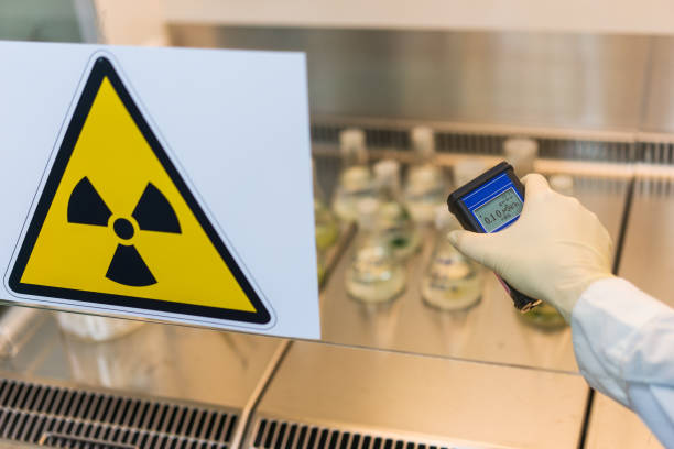 istock the scientist measures the level of radiation 1288755511