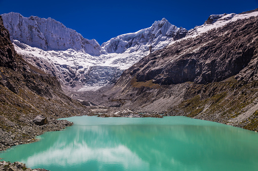 Llaca lagoon with Glacier and snowcapped Cordillera Blanca - Ancash Andes, Peru