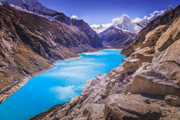istock Laguna Paron (Paron lagoon) and snowcapped Cordillera Blanca – Ancash, peruvian Andes, Peru 1288757913