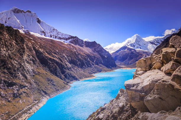 istock Laguna Paron (Paron lagoon) and snowcapped Cordillera Blanca – Ancash, peruvian Andes, Peru 1288758436