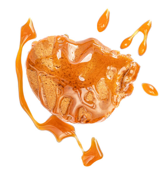 istock Gingerbread  cookie with toffee caramel sauce isolated on white background. 1288758457