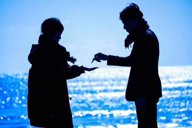 istock A man handing a key to a woman 1288759401