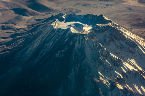 Aerial view of snowcapped Vulcano in Peruvian Andes, dramatic landscape - Peru