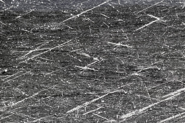istock Dirt and mud on a black paint of car. Muddy background on car surface. 1288761369
