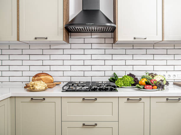 istock Modern kitchen interior with products for cooking lunch. 1288775546