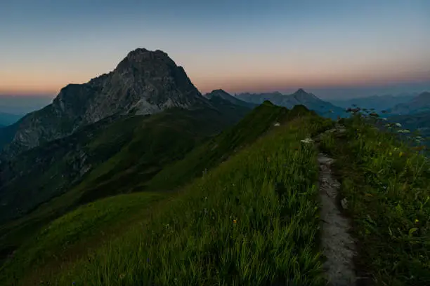 Fantastic sunset tour on the beautiful panoramic mountain Hoferspitze near Schrocken in the Allgau Alps, Kleinwalsertal