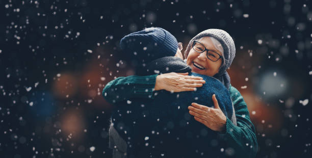 portrait of loving family on fireworks background - celebrating friends winter imagens e fotografias de stock