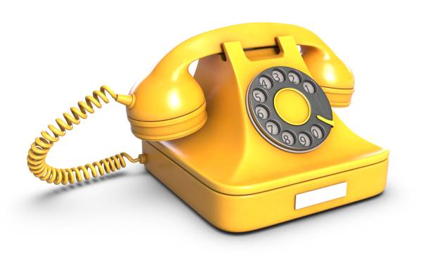 istock Render of Yellow retro phone isolated on white background 1288781385