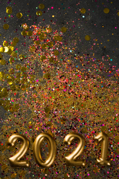 istock 2021 New year greeting card, golden digits in sparkle background 1288781985