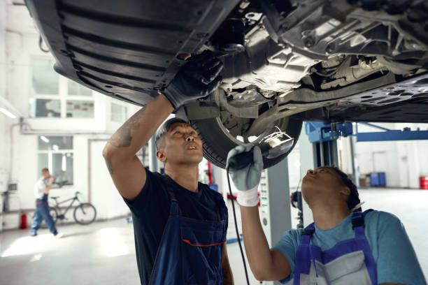 istock Asian man and african american girl under machine bottom 1288782831