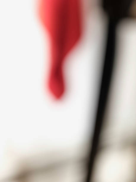 Abstract blurred background image for mystery, seduction, blood, death, vendetta, challenge, aggression, triumph, fear, resolution, or deep emotional theme. Defocused backdrop image with abstract shapes, soft focus, and contrasting colors of red, black, and white. vendetta stock pictures, royalty-free photos & images