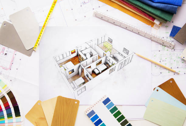 istock Interior designer desktop with house sketch 1288793811