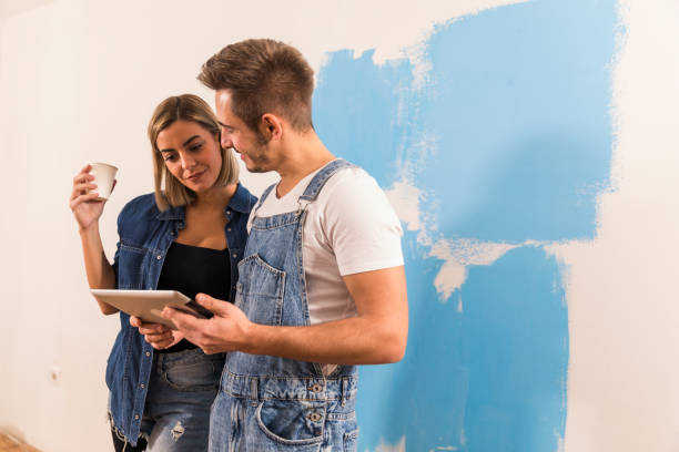 istock Drinking coffee and looking at ideas for home improvements 1288794787
