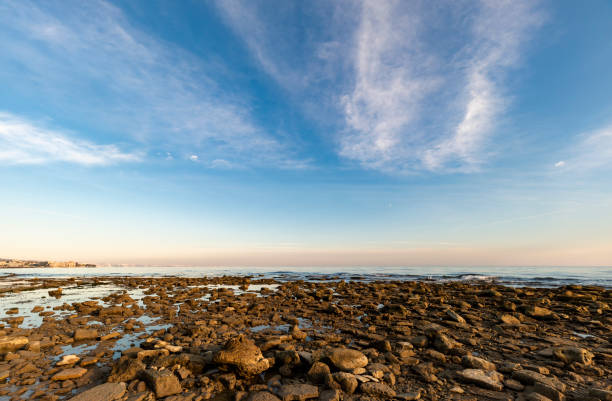 Still sea water before sunset at the Black Sea shore near Balchik's Tuzla place. Bulgaria, Europe.