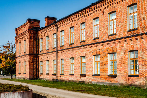 istock Beautiful vintage red brick building at sunny day 1288798856
