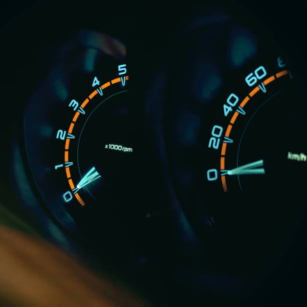 istock Speedometer in the car on the dashboard at night 1288800297